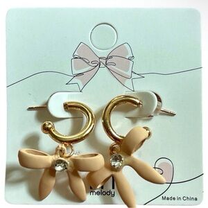 Gold Hoop Earrings with Beige Flower Charms
